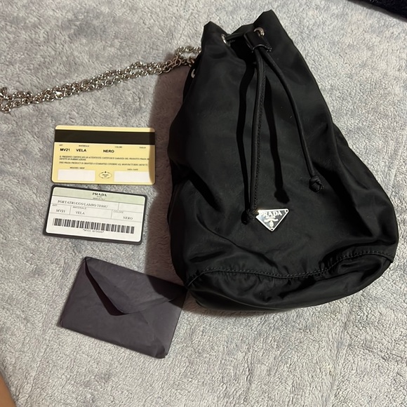 Prada Handbags - Pre-loved travel Prada drawstring bag